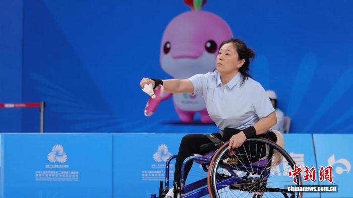 轮椅上的羽毛球梦想成真:周俊青与陈满塘以拼